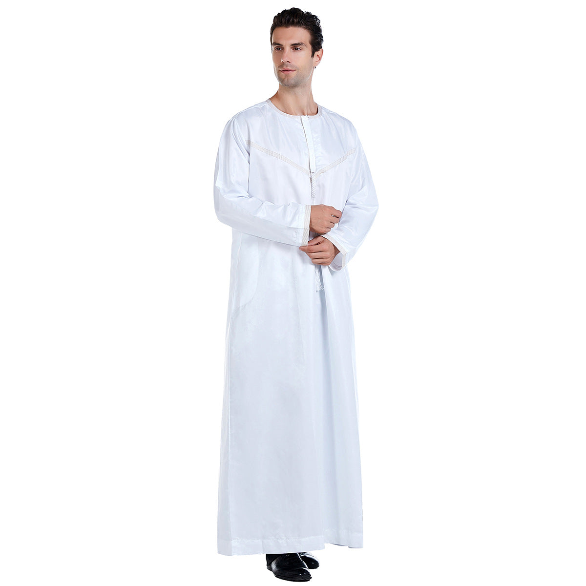 Exclusive Emirati Men's Thobe in White by Hikmah Boutique, a Modest Clothing garment that effortlessly combines traditional Islamic elegance with contemporary Modest style  making it a perfect choice for any occasion like Eid, Ramadan or Muslim Islamic Wedding.