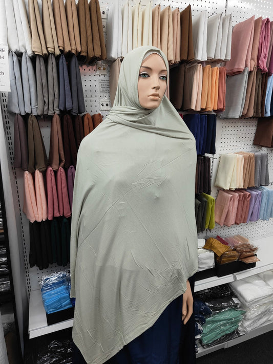 Discover our premium French Grey Jersey Hijab at Hikmah Boutique. Soft, stretchy, and perfect for summer, it's the ideal choice for stylish and comfortable modest fashion. Shop now!