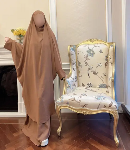 Introducing our elegant Brown French Jilbab, available exclusively at Hikmah Boutique. Made with premium materials, this jilbab is designed for comfort, durability and style. The rich brown color is perfect for any occasion, whether you're attending a formal event or spending time with family and friends. 