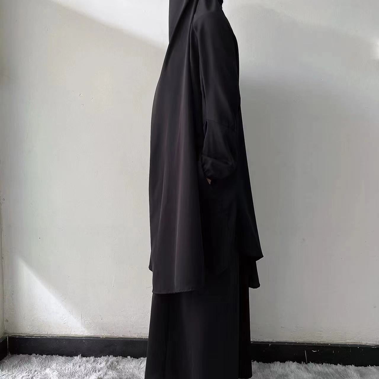 Elevate your prayer experience with our Black French Jilbab Prayer Set from Hikmah Boutique. This elegant one-size jilbab and skirt set, featuring cuff sleeves, combines style and modesty effortlessly. 