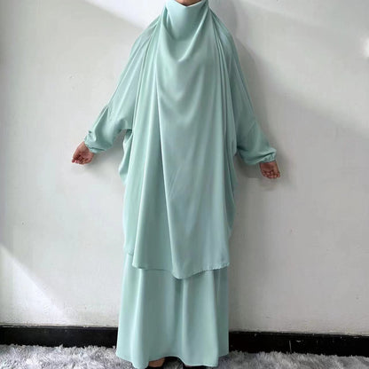 Discover the beauty of modest fashion with our Dusty Green French Jilbab Prayer Set, exclusively at Hikmah Boutique. This one-size jilbab and skirt set, featuring cuff sleeves, is crafted from high-quality Nida for maximum comfort and breathability.