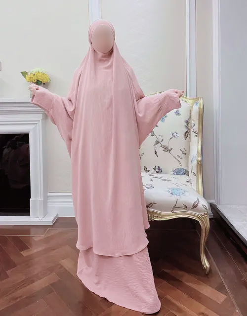 Discover the epitome of elegance with our Pink French Jilbab, a stunning two-piece set available exclusively at Hikmah Boutique. Crafted from premium materials, this Jilbab is designed to elevate your style while ensuring utmost comfort. Get yours now at a reasonable price and experience at Hikmah Boutique