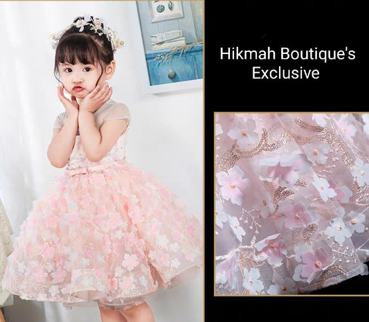 Transform your little princess into the epitome of charm and style with our enchanting Fairy Girls Dress from Hikmah Boutique. This dress is a delightful combination of elegance and playfulness, perfect for a variety of occasions, including parties, weddings, and special events. Competitively priced to match your budget.