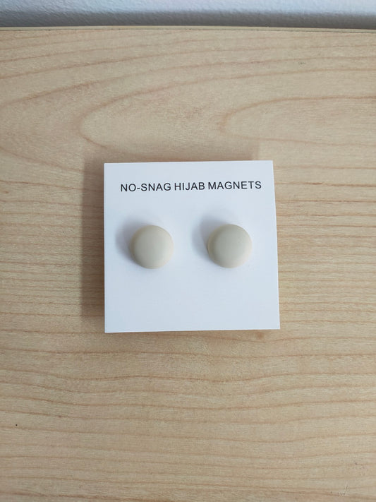 Elevate your hijab styling with our Hijab Magnets in Cream Twin-Pack, providing a convenient and elegant way to secure your hijab. Shop now at Hikmah Boutique for stylish magnetic hijab pins.