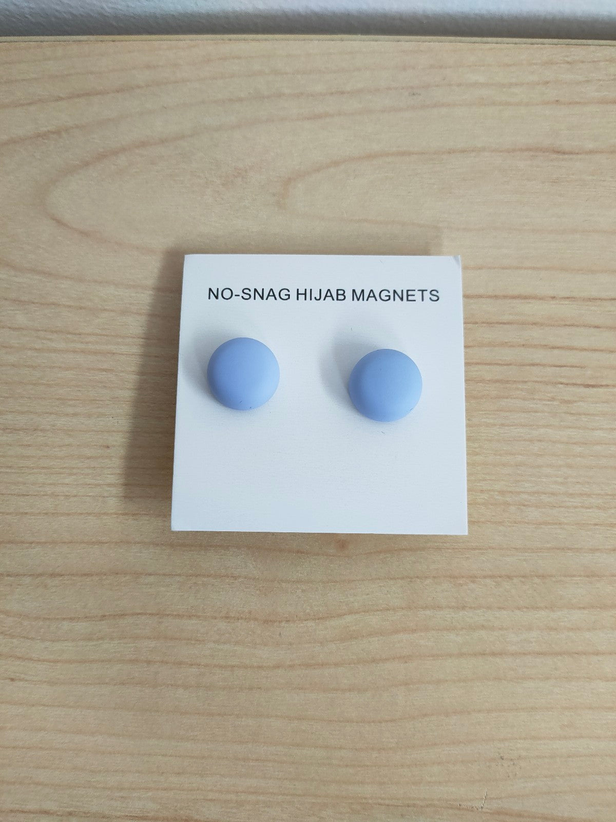 Explore our Hijab Magnets in Dusty Blue Twin-Pack for a seamless and stylish way to secure your hijab. Shop now at Hikmah Boutique for premium magnetic hijab fasteners.