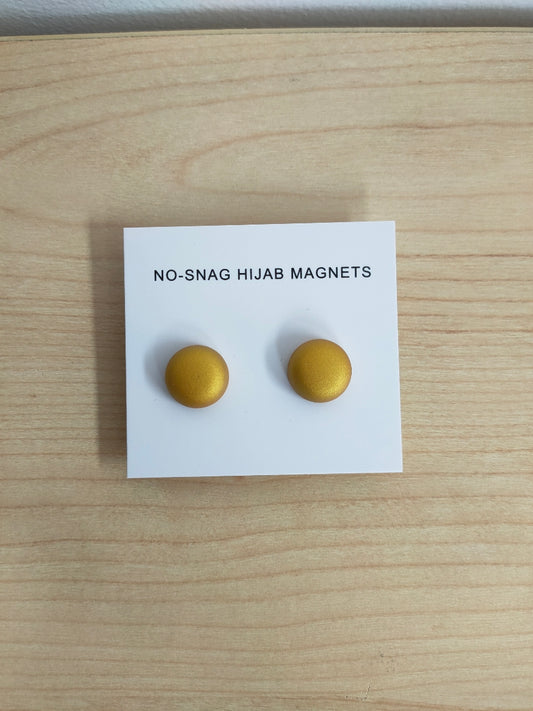 Shop our Hijab Magnets in Gold Twin-Pack for a stylish and functional solution to securing your hijab. Explore magnetic hijab clips at Hikmah Boutique for the best selection.