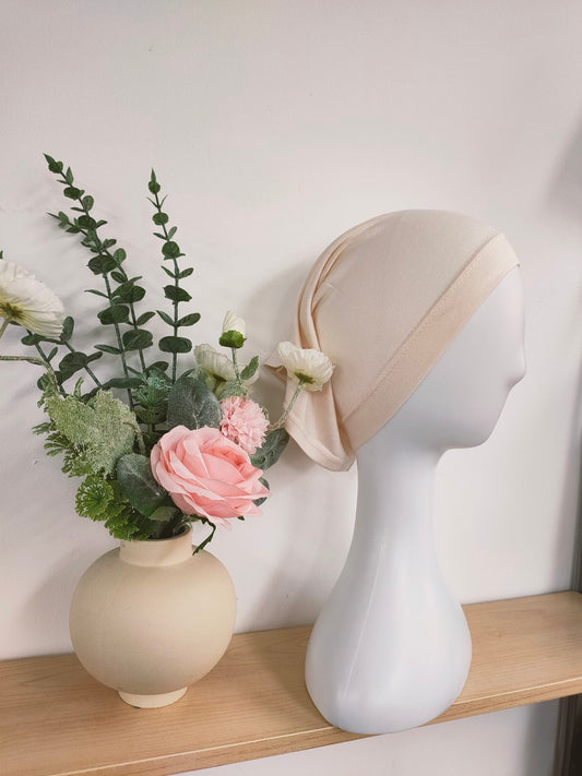 Shop the Hijab Open Undercap in Cream Beige at Hikmah Boutique. Combining timeless elegance and comfort, this high-quality undercap keeps your hijab in place. Discover the best in modest clothing in Sydney, Australia, at a reasonable price.