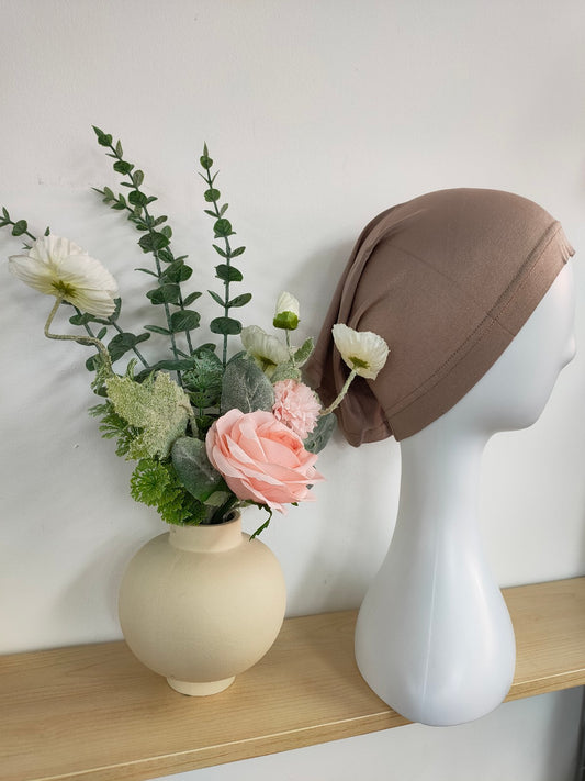 Shop the Hijab Open Undercap in Dark Khaki at Hikmah Boutique. Combining chic style and comfort, this high-quality undercap keeps your hijab in place. Discover the best in modest clothing in Sydney, Australia, at a reasonable price.