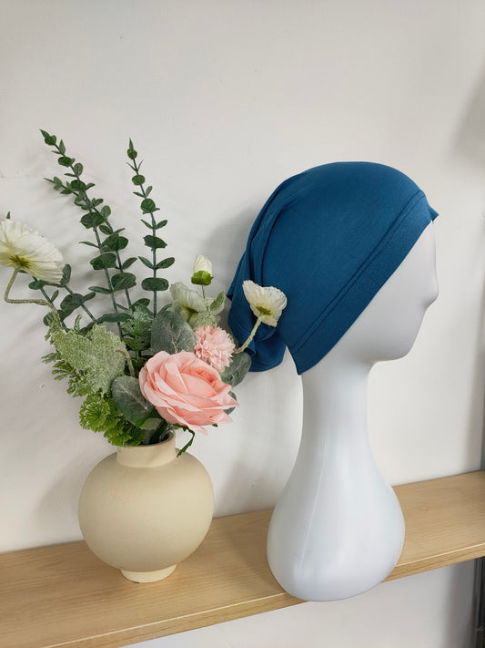 Shop the Hijab Open Undercap in Dusty Blue at Hikmah Boutique. Combining chic style and comfort, this high-quality undercap keeps your hijab in place. Discover the best in modest clothing in Sydney, Australia, at a reasonable price.