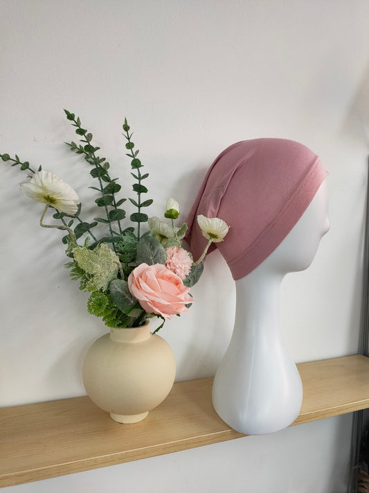 Shop the Hijab Open Undercap in Dusty Pink at Hikmah Boutique. Combining elegance and comfort, this high-quality undercap keeps your hijab in place. Discover the best in modest clothing in Sydney, Australia, at a reasonable price.