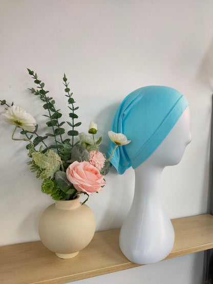 Shop the Hijab Open Undercap in Light Blue at Hikmah Boutique. Combining grace and comfort, this high-quality undercap keeps your hijab in place. Discover the best in modest clothing in Sydney, Australia, at a reasonable price.