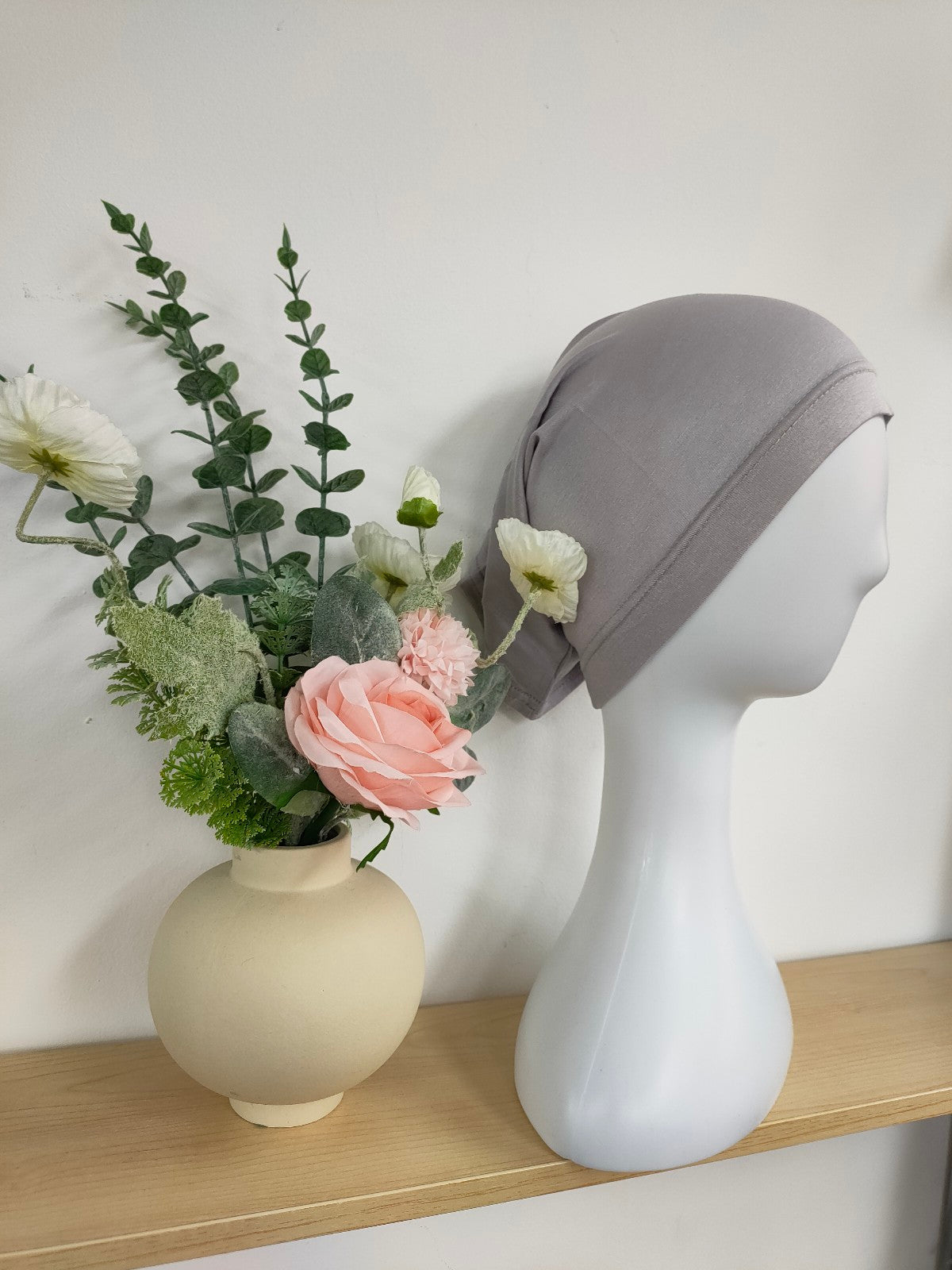 Shop the Hijab Open Undercap in Silver Grey at Hikmah Boutique. Combining sophistication and comfort, this high-quality undercap keeps your hijab in place. Discover the best in modest clothing in Sydney, Australia, at a reasonable price.