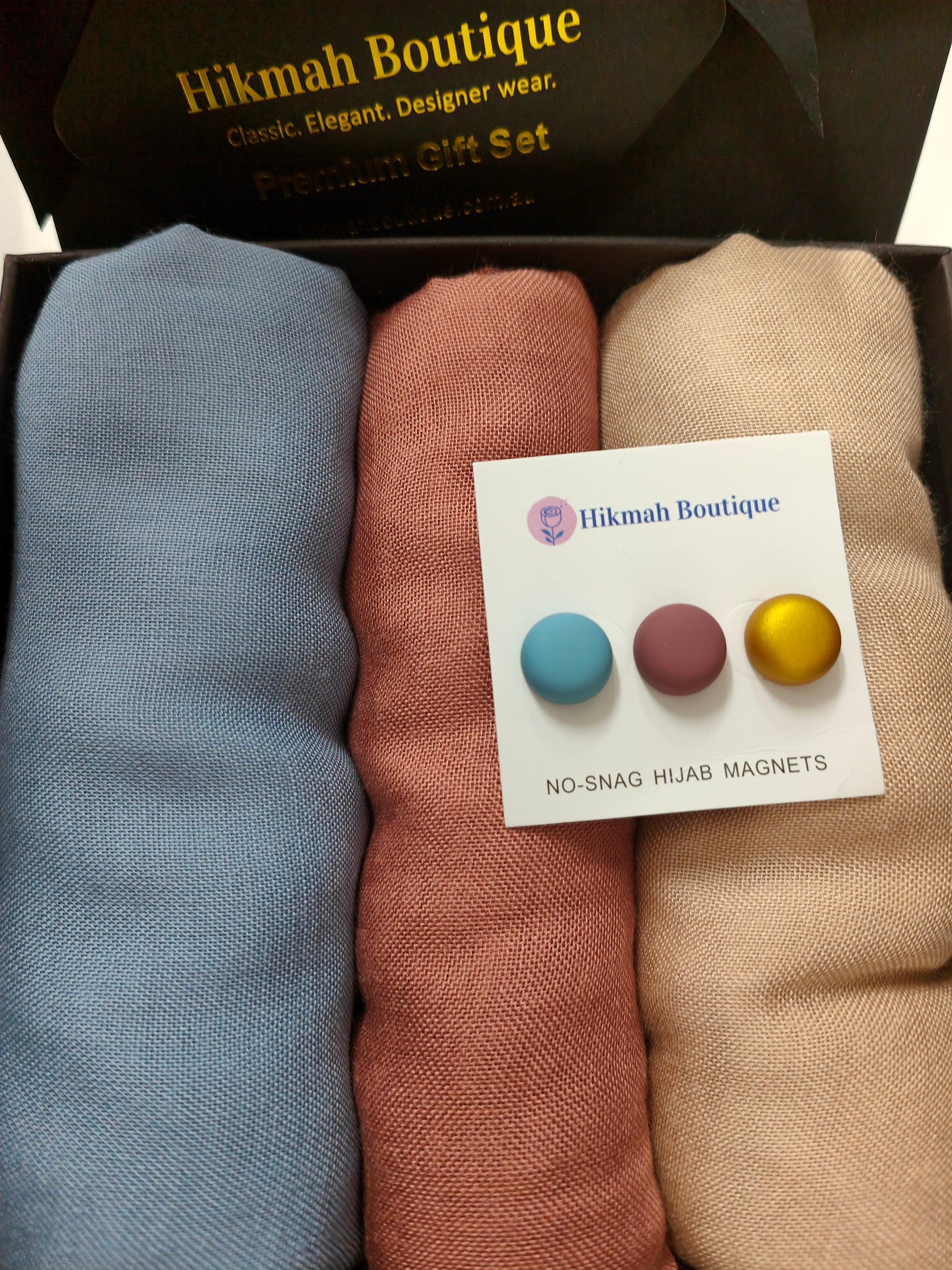 Introducing our exquisite Premium Viscose Hijab Gift Box with magnetic hijab pins triple pack, designed to delight and impress every hijab enthusiast. This carefully curated gift box combines elegance, comfort, and functionality, making it the perfect present for any occasion. Shop now at Hikmah Boutique
