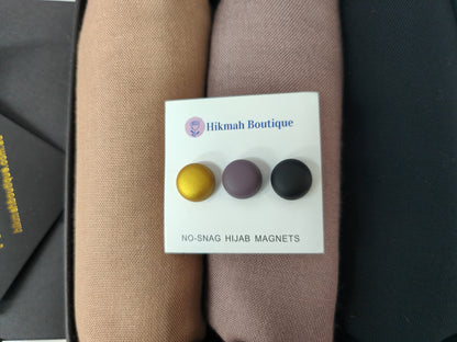 Introducing our exquisite Premium Viscose Hijab Gift Box with magnetic hijab pins triple pack, designed to delight and impress every hijab enthusiast. This carefully curated gift box combines elegance, comfort, and functionality, making it the perfect present for any occasion. Shop now at Hikmah Boutique
