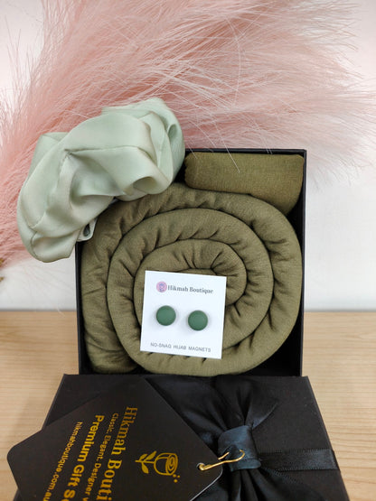 Jersey Hijab Gift Set - Olive Green: Discover the elegance and comfort of the Jersey Hijab Gift Set - Gloxinia, exclusively sold by Hikmah Boutique. This exquisite Hijab gift set includes one premium Jersey Hijab, Hijab Cap and matching accessories.