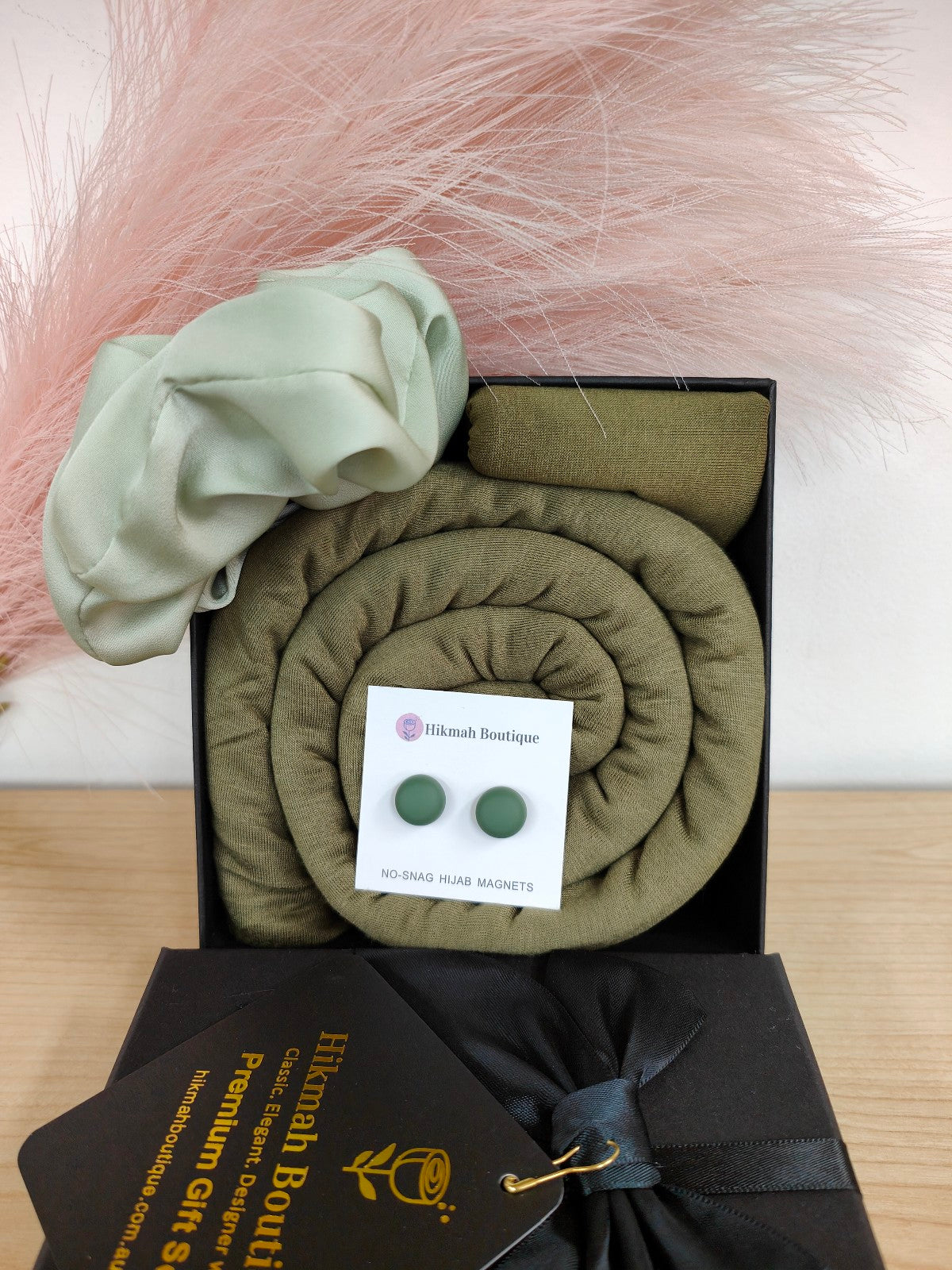 Discover the elegance and comfort of the Jersey Hijab Gift Set sold by Hikmah Boutique. You can choose your favorite color of Jersey Hijab. This exquisite Hijab gift set includes one premium Jersey Hijab, Hijab Cap and matching accessories.