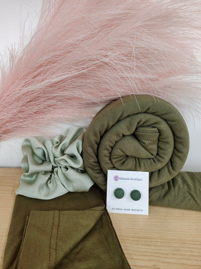 Jersey Hijab Gift Set - Olive Green: Discover the elegance and comfort of the Jersey Hijab Gift Set - Gloxinia, exclusively sold by Hikmah Boutique. This exquisite Hijab gift set includes one premium Jersey Hijab, Hijab Cap and matching accessories.