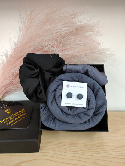 Jersey Hijab Gift Set - Slate Grey: Discover the elegance and comfort of the Jersey Hijab Gift Set - Gloxinia, exclusively sold by Hikmah Boutique. This exquisite Hijab gift set includes one premium Jersey Hijab, Hijab Cap and matching accessories.