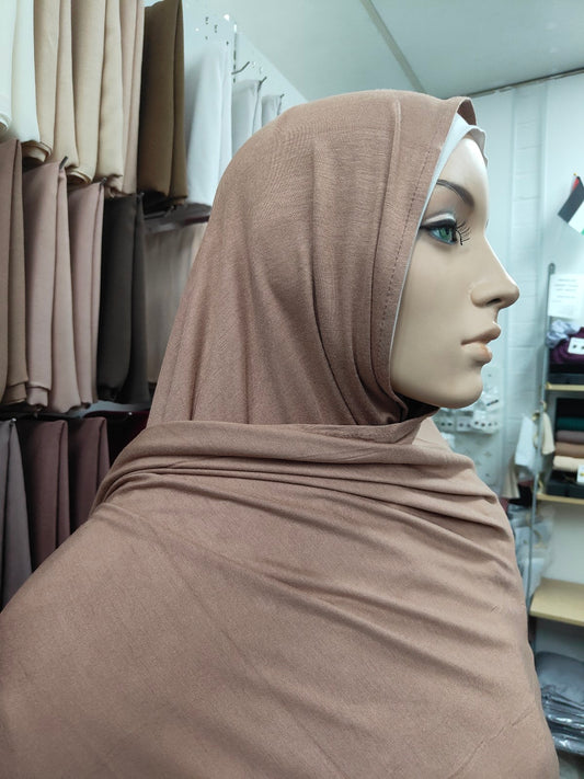Shop our premium Jersey Hijab in Dusty Brown at Hikmah Boutique. Discover soft, comfortable, and stylish Jersey hijabs perfect for any occasion. Affordable and lightweight Jersey Hijabs, ideal for summer and sports. Visit our online hijab shop today!