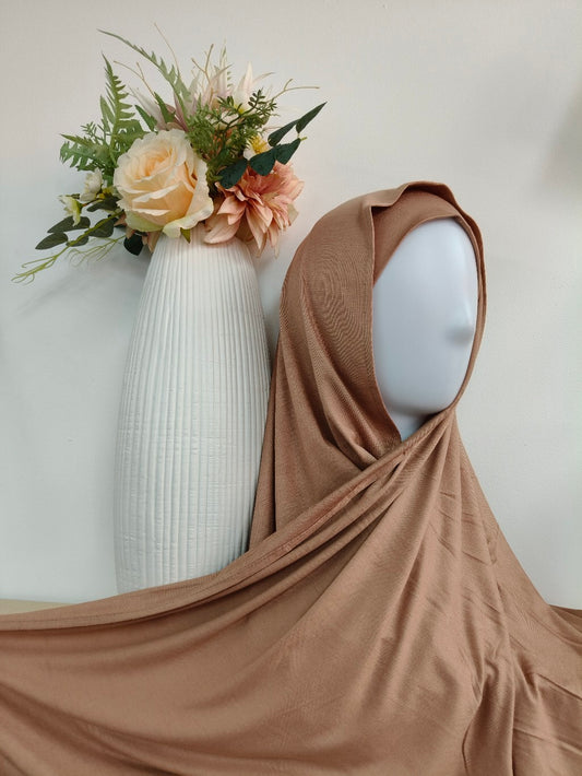 Shop our premium Jersey Hijab in Dusty Brown at Hikmah Boutique. Discover soft, comfortable, and stylish Jersey hijabs perfect for any occasion. Affordable and lightweight Jersey Hijabs, ideal for summer and sports. Visit our online hijab shop today!