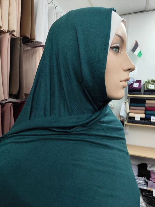 Shop our premium Jersey Hijab in Emerald Green at Hikmah Boutique. Discover soft, comfortable, and stylish Jersey hijabs perfect for any occasion. Affordable and lightweight Jersey Hijabs, ideal for summer and sports. Visit our online hijab shop today!
