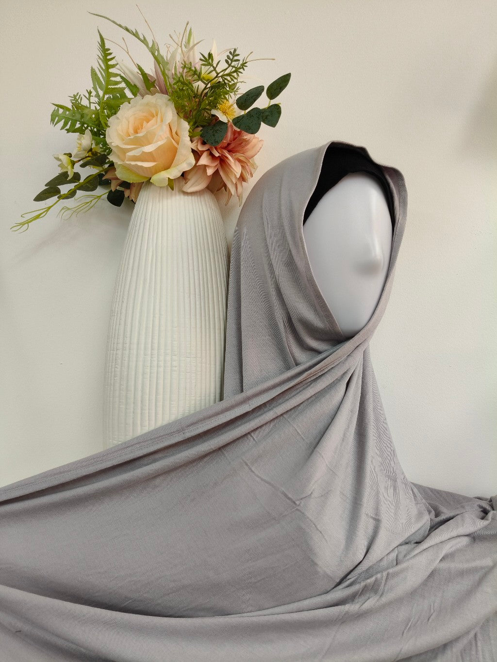 Shop our premium Jersey Hijab in Silver Grey at Hikmah Boutique. Discover soft, comfortable, and stylish Jersey hijabs perfect for any occasion. Affordable and lightweight Jersey Hijabs, ideal for summer and sports. Visit our online hijab shop today!