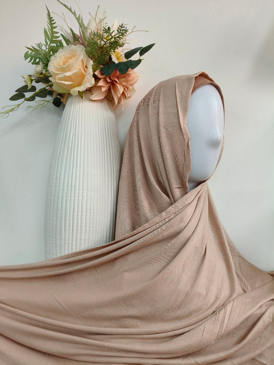 Discover the Apricot Jersey Hijab at Hikmah Boutique. Lightweight, breathable, and non-slip. Available at discounted prices with fast shipping in Australia and worldwide.