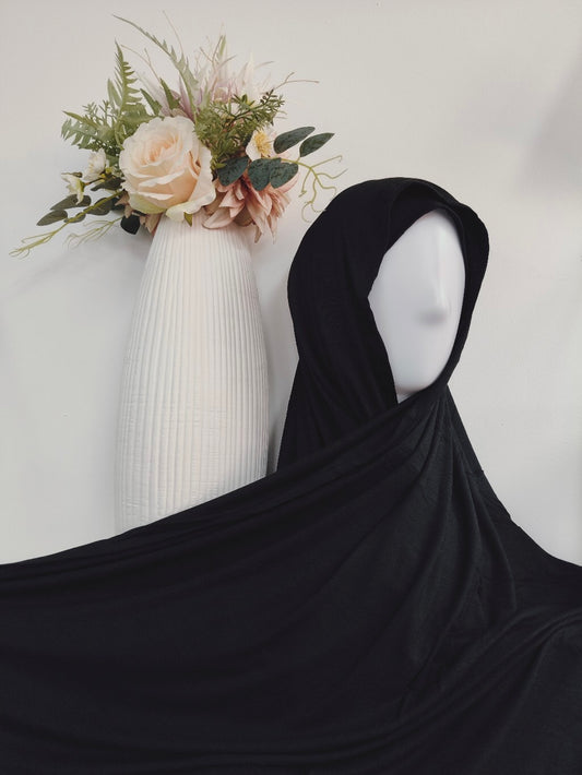 Shop Black Jersey Hijab at Hikmah Boutique. Premium quality Jersey Hijab, super soft, and non-slippery Jersey Hijab. Available at discounted prices with fast shipping Australia-wide.