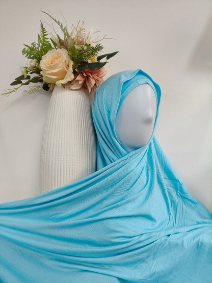 Discover our Light Blue Jersey Hijab at Hikmah Boutique. Soft, stretchable, and stylish hijabs perfect for summer. Shop now for affordable premium hijabs online!