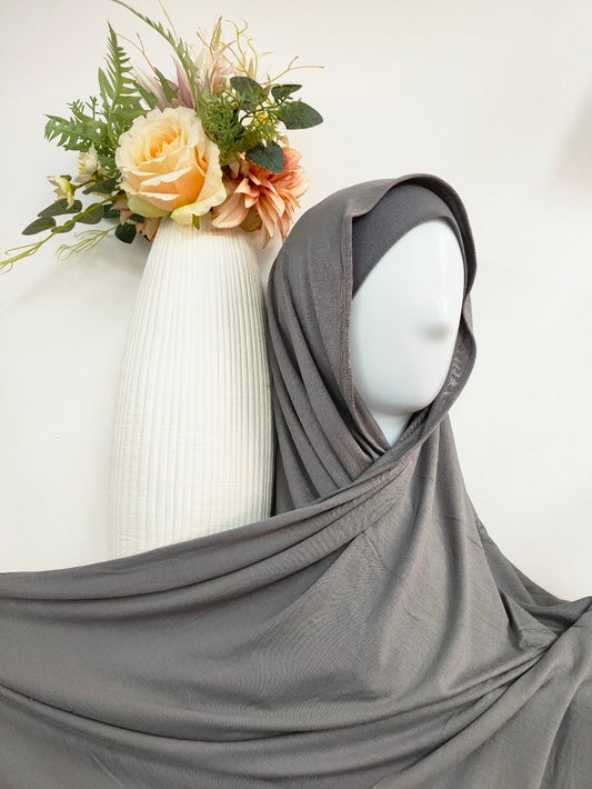 Shop the Pearl Grey Jersey Hijab at Hikmah Boutique. Premium quality Jersey Hijab, super soft, and non-slippery Jersey Hijab. Available at discounted prices with fast shipping Australia-wide.