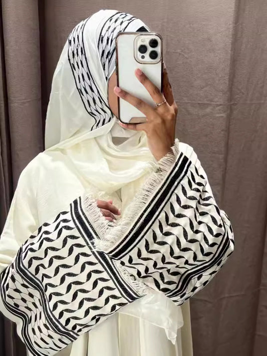 Keffiyeh Sleeve Open Abaya in White for solidarity and resistance. Perfect for any occasion, this abaya blends comfort and Palestine tradition.