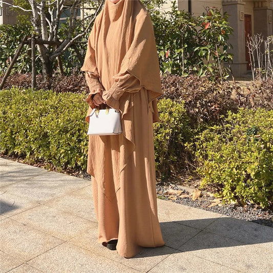 Shop Modest Clothing with our Khaki Crepe Crinkle Abaya with Double Layer Khimar Set – Exclusive Modesty at Hikmah Boutique Indulge in the sophisticated simplicity of our Khaki Crepe Crinkle Abaya with Double Layer Khimar Set, an emblem of modesty and elegance exclusively available at Hikmah Boutique.