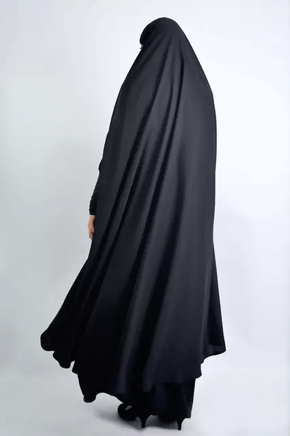Indulge in the essence of refined fashion with our Lightweight Navy Jilbab, an exquisite creation curated exclusively by Hikmah Boutique. Graceful and enchanting, this jilbab is thoughtfully designed to elevate your modest style while embracing ultimate comfort. A Captivating Presence: Wrapped in a luxurious navy Jilbab.