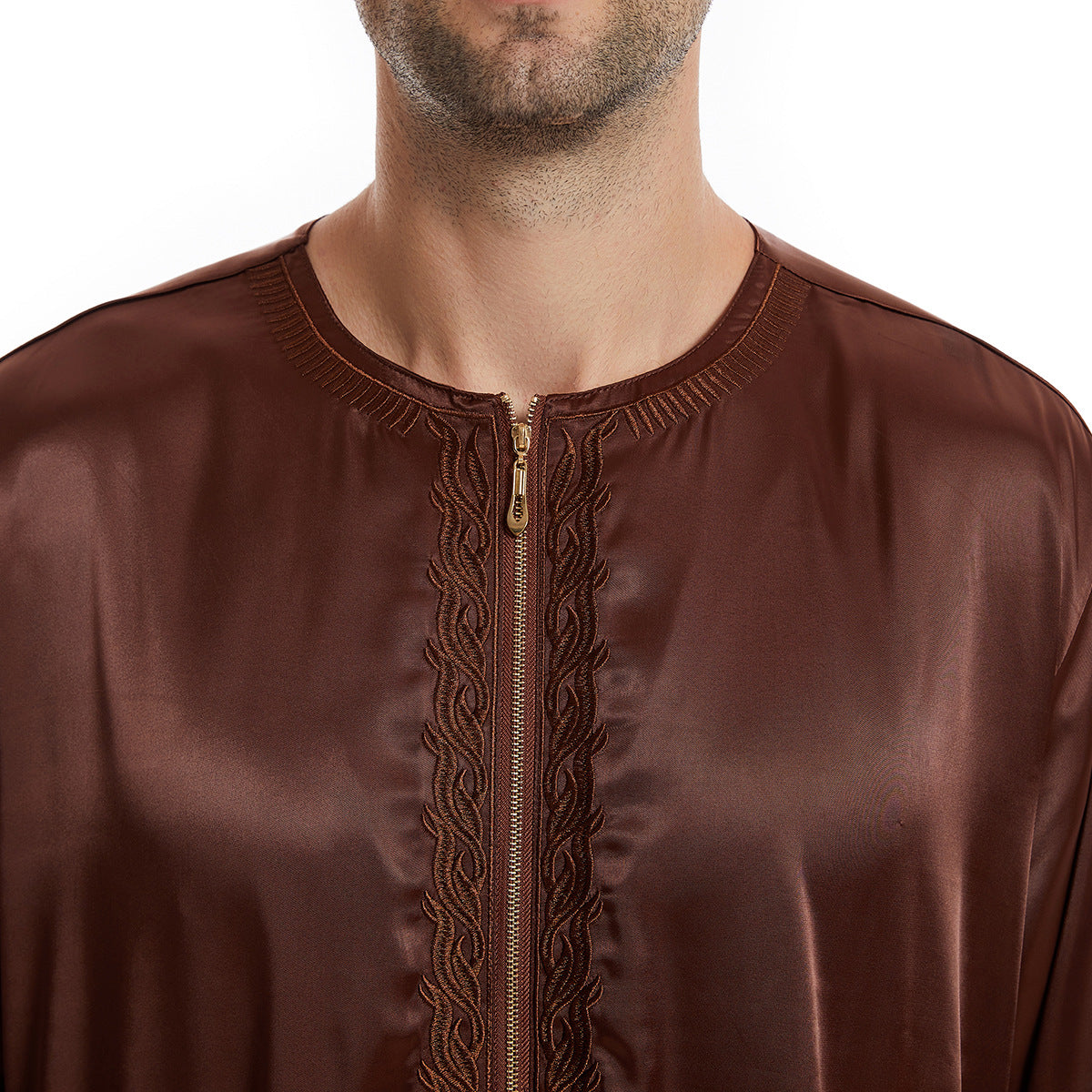 Hikmah Boutique's exquisite Men's Abaya Full Sleeves in Coffee, meticulously crafted to embody elegance and comfort synonymous with Islamic clothing for men. Each piece is a fusion of tradition and contemporary Modest Clothing fashion.