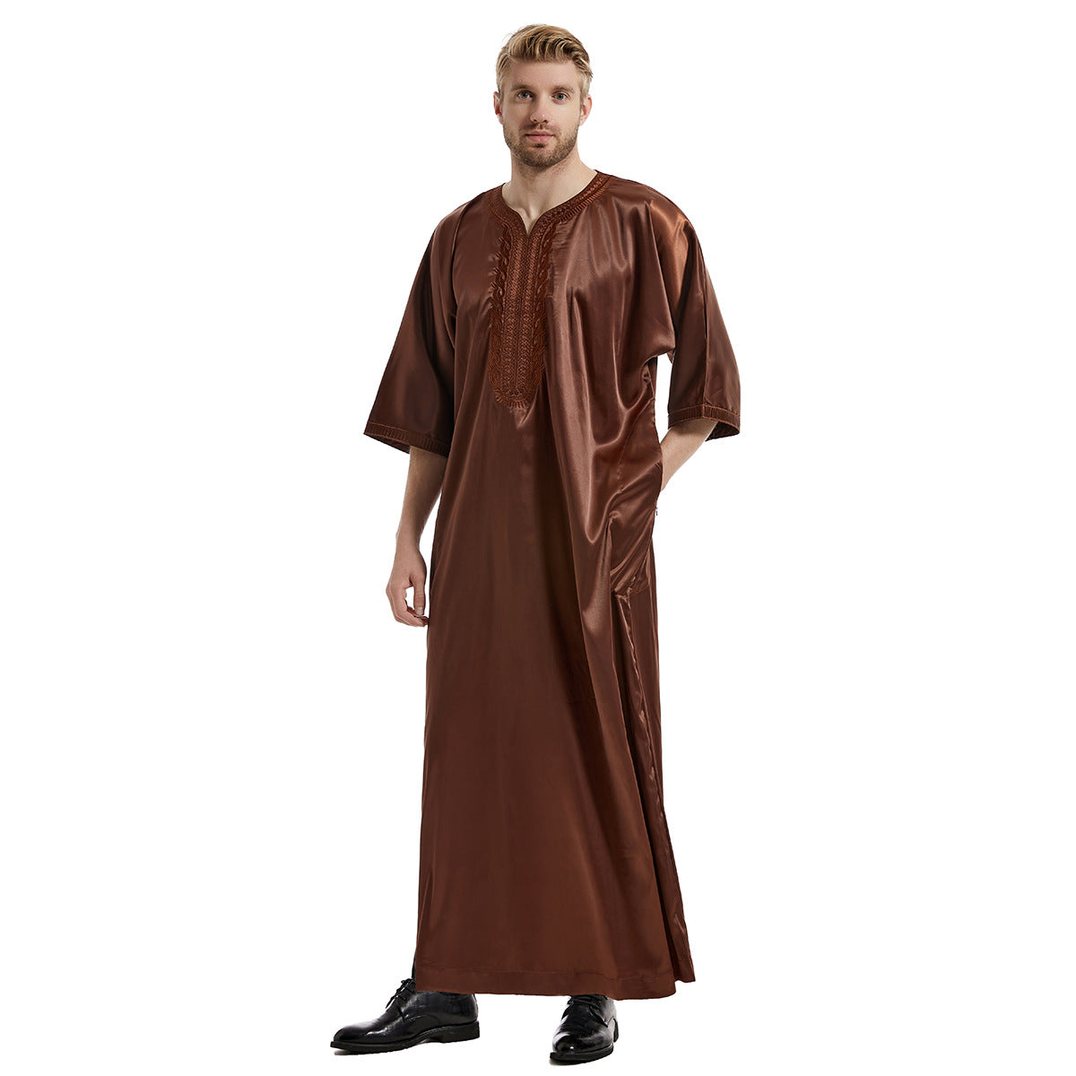Discover sophistication with our Men's Abaya Half Sleeves in Coffee at Hikmah Boutique. Crafted from premium materials with exquisite embroidery, this abaya offers both style and comfort. Elevate your modest clothing wardrobe with this versatile Islamic attire.