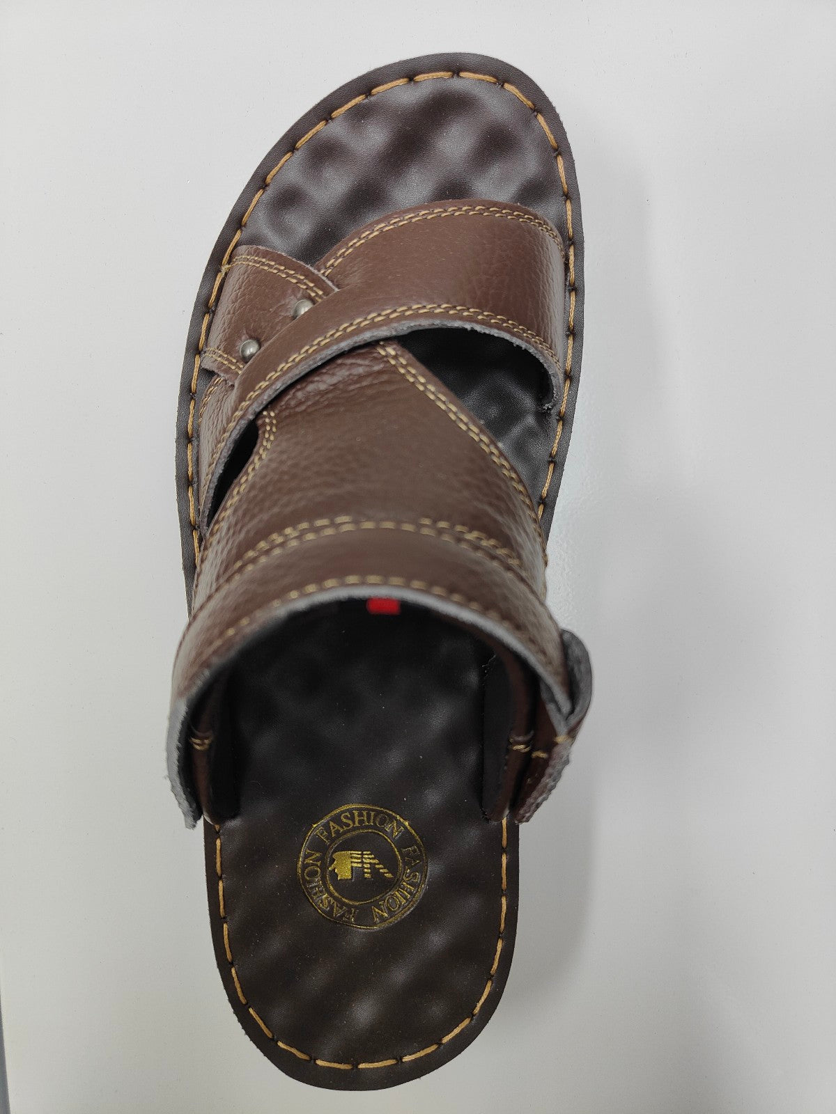 Elevate your style with Dark Brown Design 2 Men's Sandals exclusively from Hikmah Boutique. Crafted with genuine cowhide leather, extra comfort, and an original design. Discover quality and affordability.
