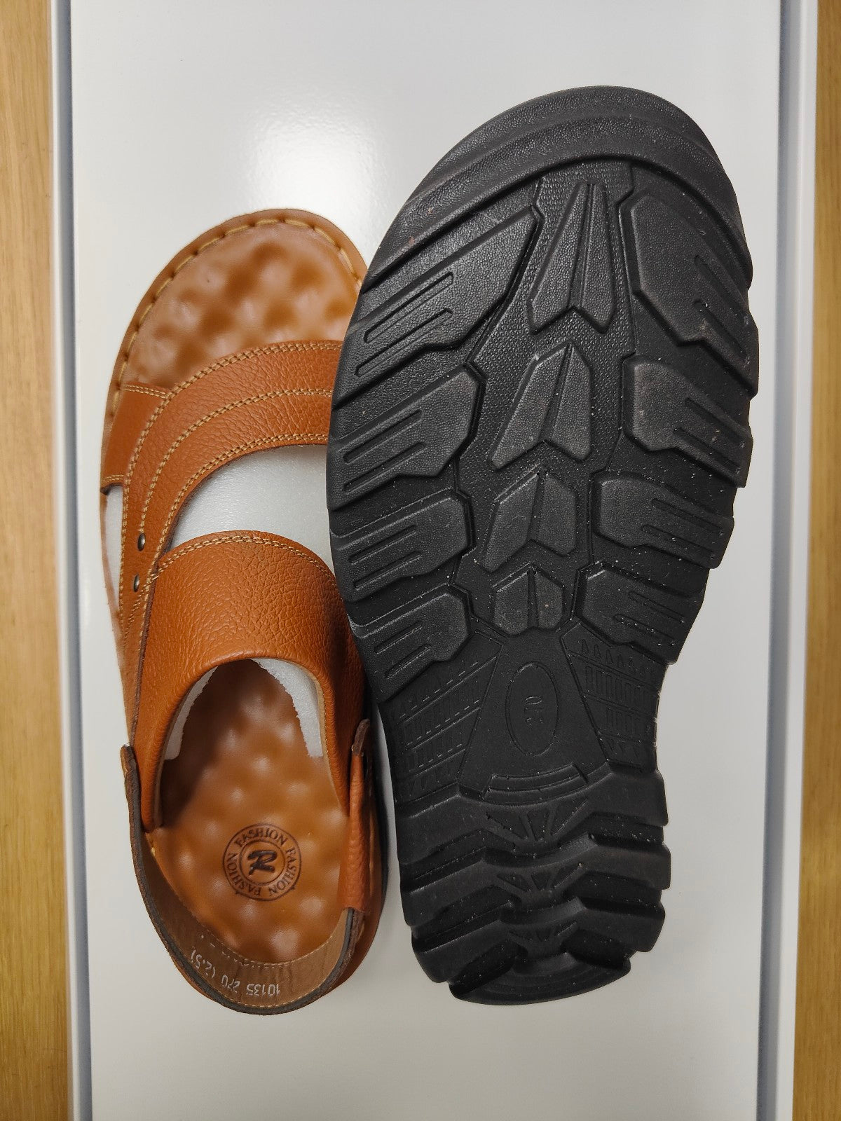 Elevate Your Style and Comfort with Light Brown Design 3 Men's Sandals Introducing the epitome of style, comfort, and quality with our Light Brown Design 3 Men's Sandals, exclusively available at Hikmah Boutique. These sandals are not just footwear; they represent a seamless blend of elegance, comfort, and durability.