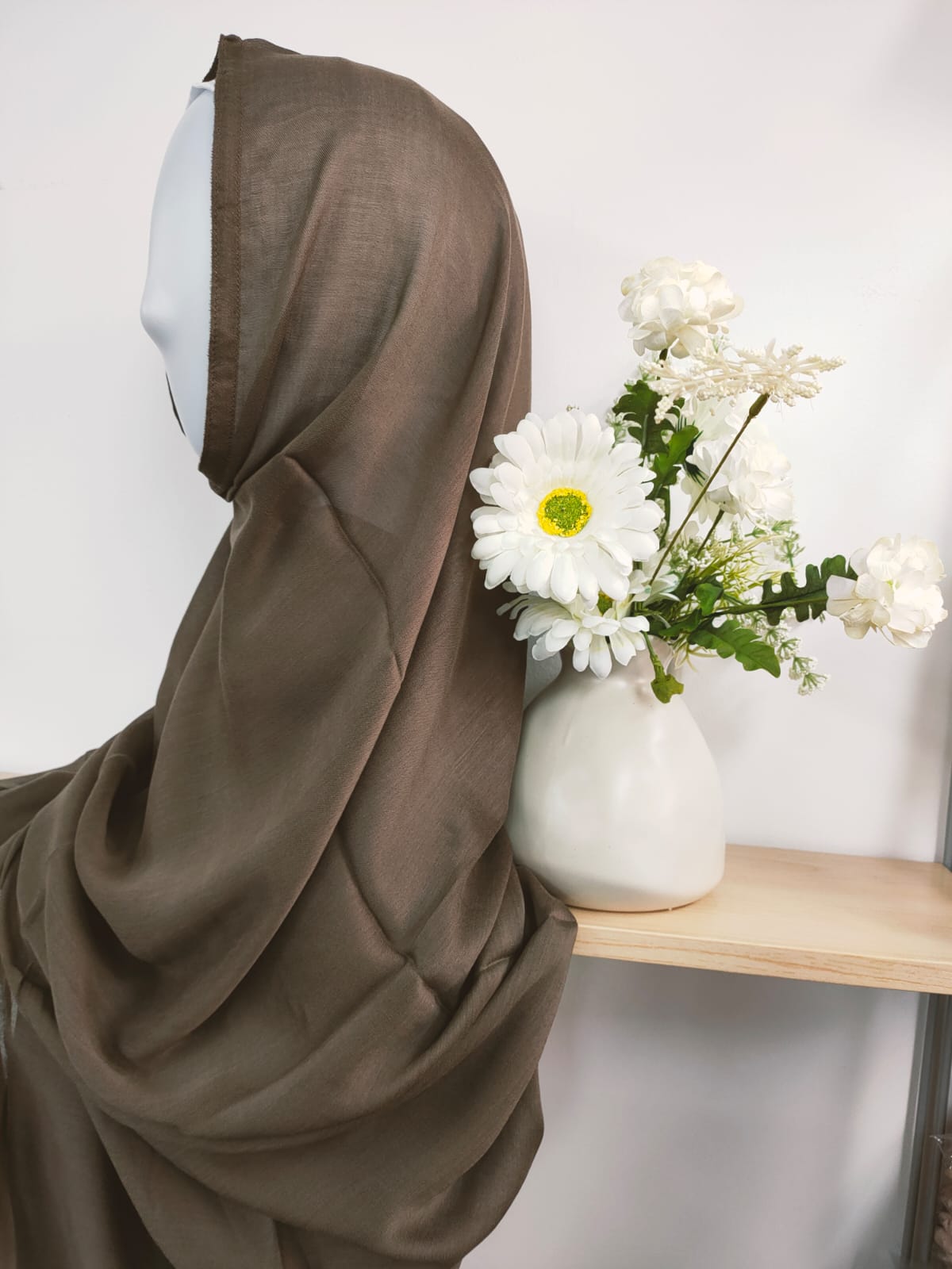 Introducing our modest yet refined Modal Hijab in Coffee, a serene addition to the wardrobe of modest women, exclusively at Hikmah Boutique! Crafted with care from premium modal fabric, this modal hijab is known for its gentle touch and breathability. Based in Australia, Deliver Worldwide.