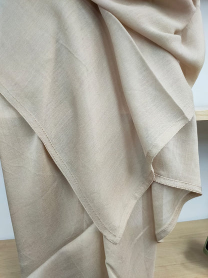 Introducing our luxurious Modal Hijab in Dark Beige, a refined addition to your hijab collection, available at Hikmah Boutique! Expertly crafted from premium modal fabric, known for its exquisite softness and breathability, this modal hijab ensures comfort and style all day. Based in Australia, Deliver Worldwide.