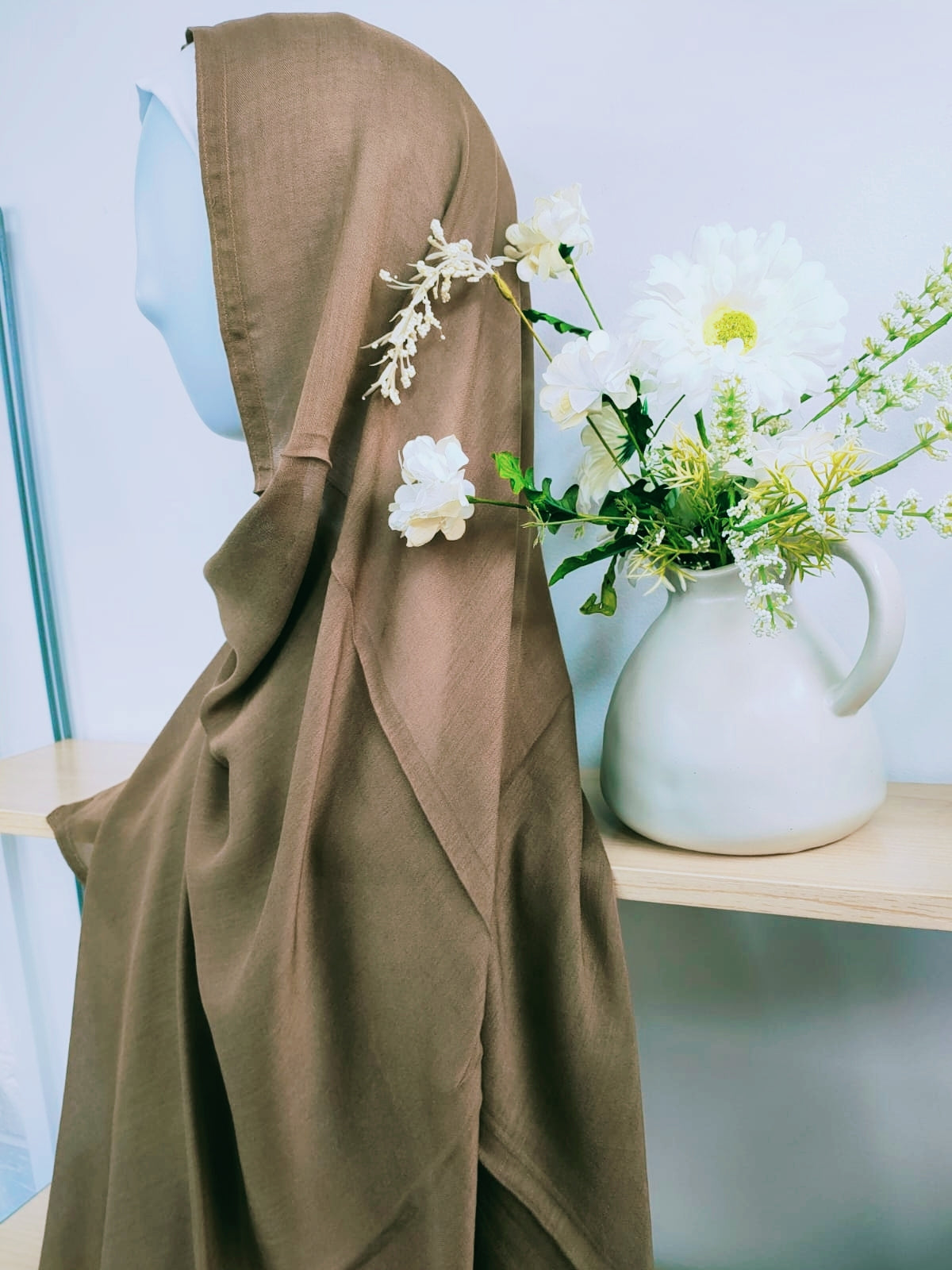 Shop now for our sophisticated Modal Hijab in Dark Khaki, a versatile staple for your hijab collection, available at Hikmah Boutique! Crafted with precision from premium modal fabric, renowned for its luxurious softness and breathability, this hijab ensures comfort and style all day. Based in Australia, Deliver Worldwide.