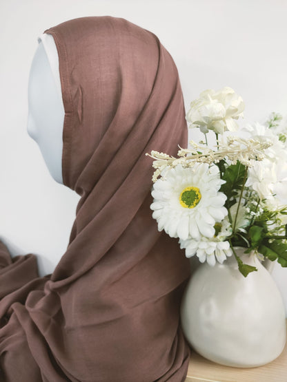 Shop now for our Modal Hijab in Dusty Mocha, a sophisticated addition to your hijab collection, available at Hikmah Boutique! made premium modal fabric, known for its luxurious softness and breathability, this modal hijab ensures comfort and style that lasts all day. Based in Australia, Deliver Worldwide. 