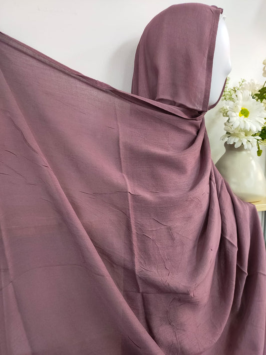 Introducing our refined Dusty Purple Modal Hijab, a timeless choice for the discerning modest woman, available at Hikmah Boutique! Crafted with precision from premium modal fabric, cherished for its gentle touch and breathability, this modal hijab promises enduring comfort and style. Based in Australia, Deliver Worldwide.