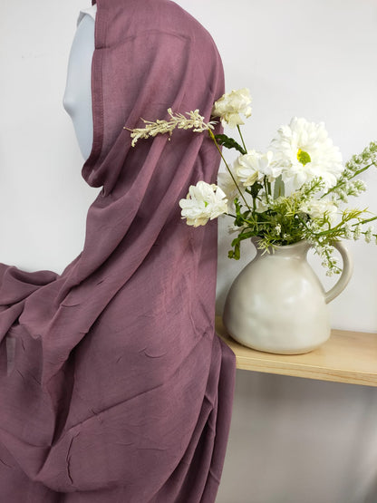 Introducing our refined Dusty Purple Modal Hijab, a timeless choice for the discerning modest woman, available at Hikmah Boutique! Crafted with precision from premium modal fabric, cherished for its gentle touch and breathability, this modal hijab promises enduring comfort and style. Based in Australia, Deliver Worldwide.