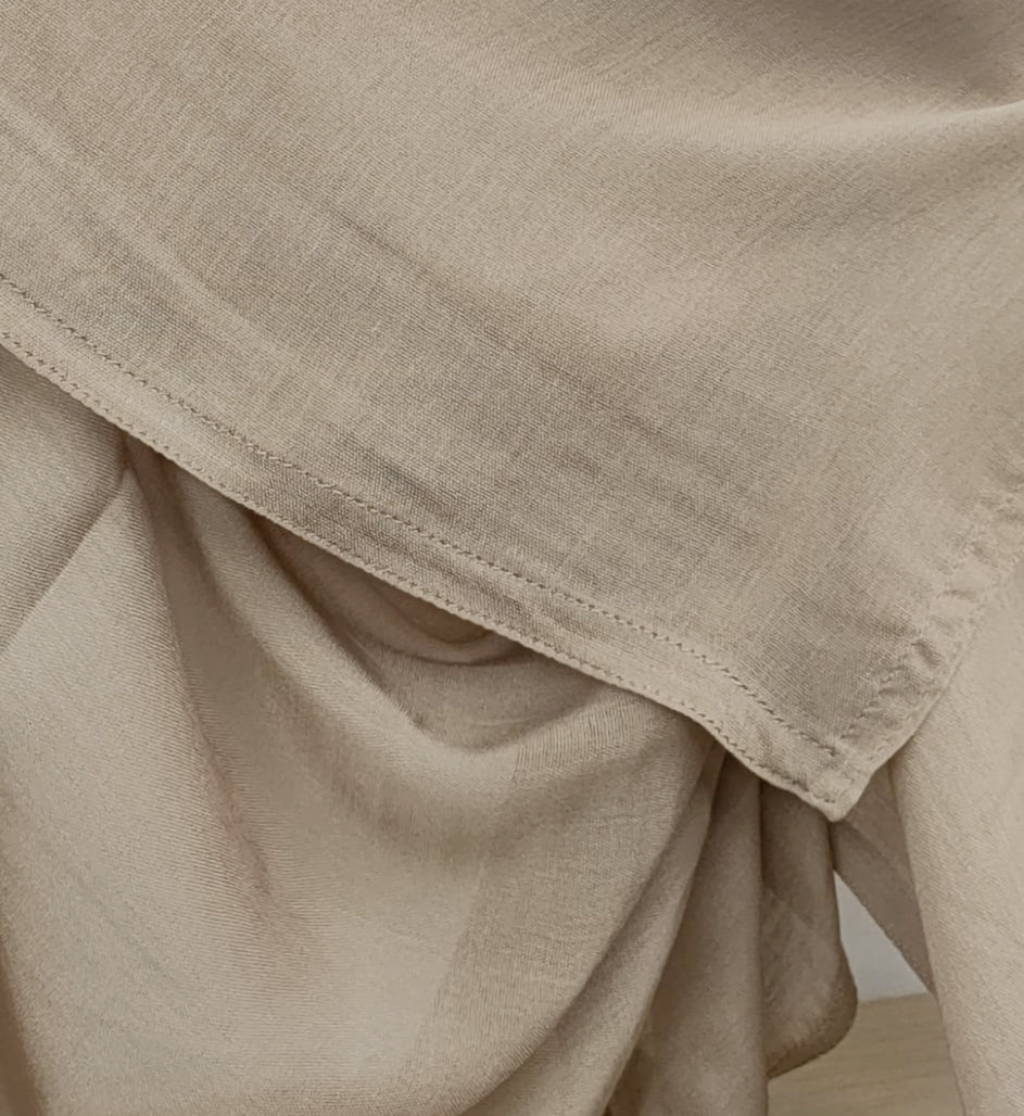 Shop now for our versatile Modal Hijab in Khaki, a must-have addition to your hijab collection, available at Hikmah Boutique! Expertly crafted from premium modal fabric, known for its luxurious softness and breathability, this modal hijab ensures comfort and style that lasts all day. Based in Australia, Deliver Worldwide.