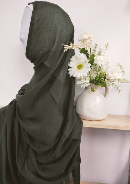 Introducing our exquisite Modal Hijab in Olive Green, a sophisticated choice for the discerning modest woman, at Hikmah Boutique! Crafted with precision from premium modal fabric, cherished for its gentle touch and breathability, this modal hijab promises enduring comfort and style. Based in Australia, Deliver Worldwide. 