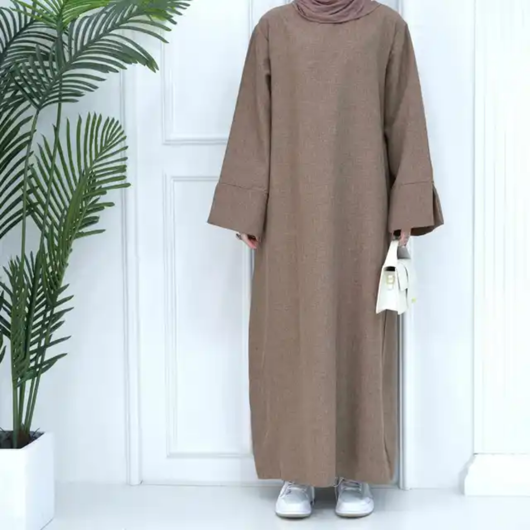 Find the Modest Plain Abaya in Dusty Brown at Hikmah Boutique Australia. Neutral design, modest fit, and affordable prices. Available in all sizes.