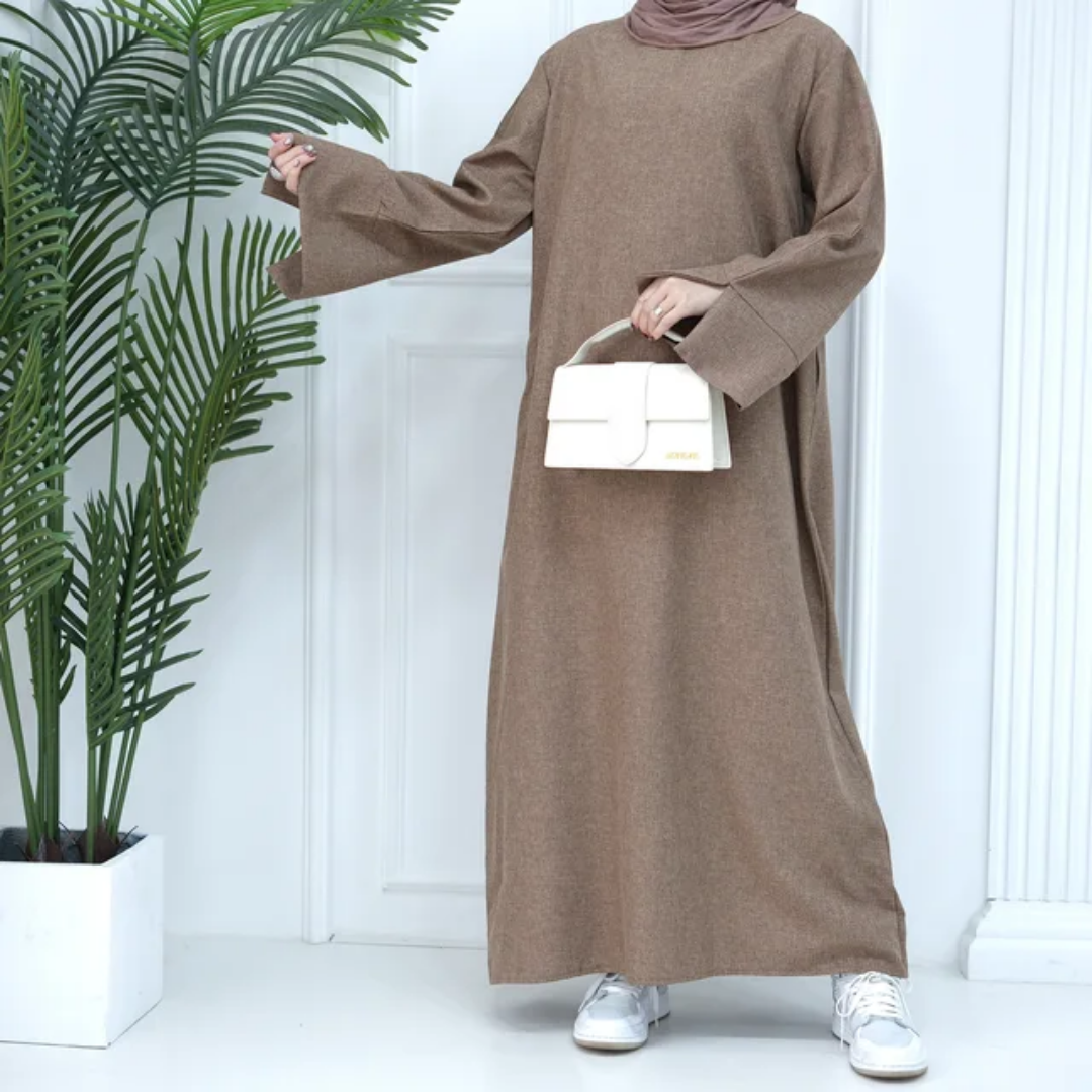 Find the Modest Plain Abaya in Dusty Brown at Hikmah Boutique Australia. Neutral design, modest fit, and affordable prices. Available in all sizes.