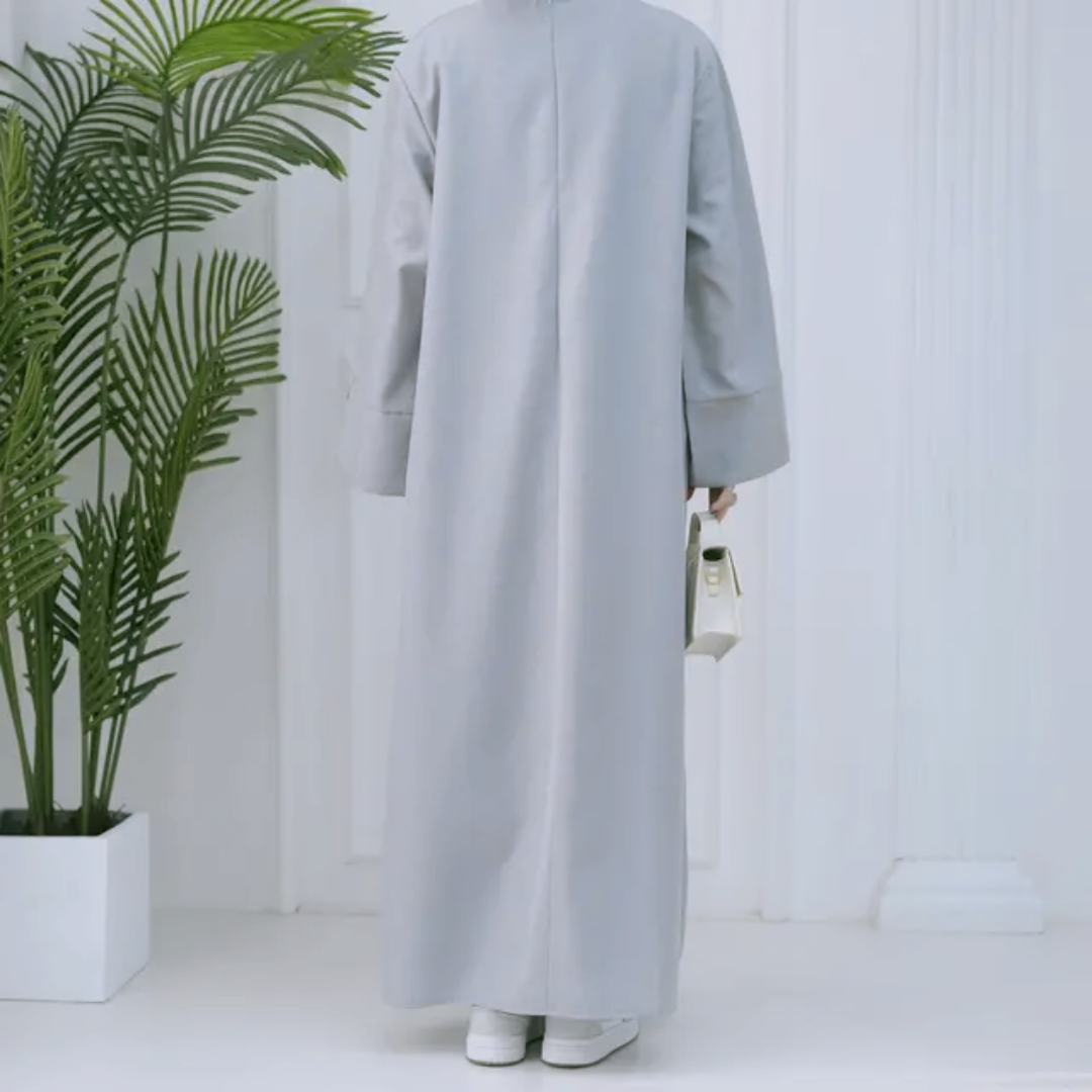 Explore the Modest Plain Abaya in Silver Grey at Hikmah Boutique Australia. Stylish, neutral design with a modest fit. Available in all sizes at a great price.