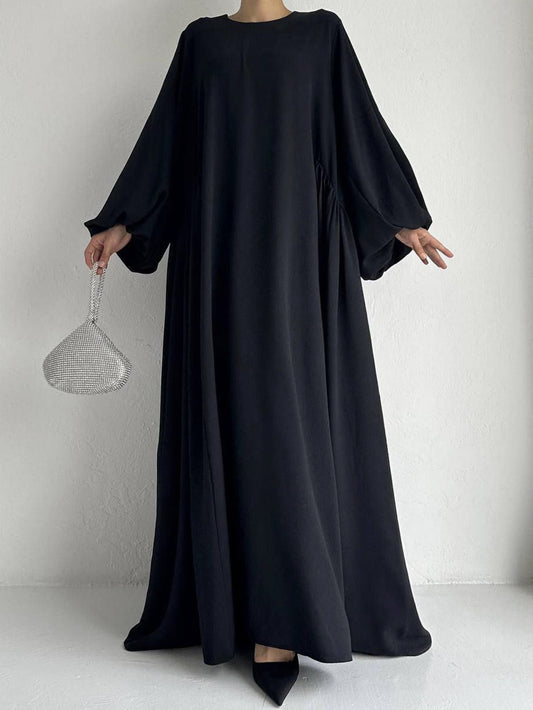 Experience comfort with our Black Modest Summer Abaya. Silky fabric, loose fit, and cuff sleeves. Available in all sizes. Shop in Australia and Sydney store.