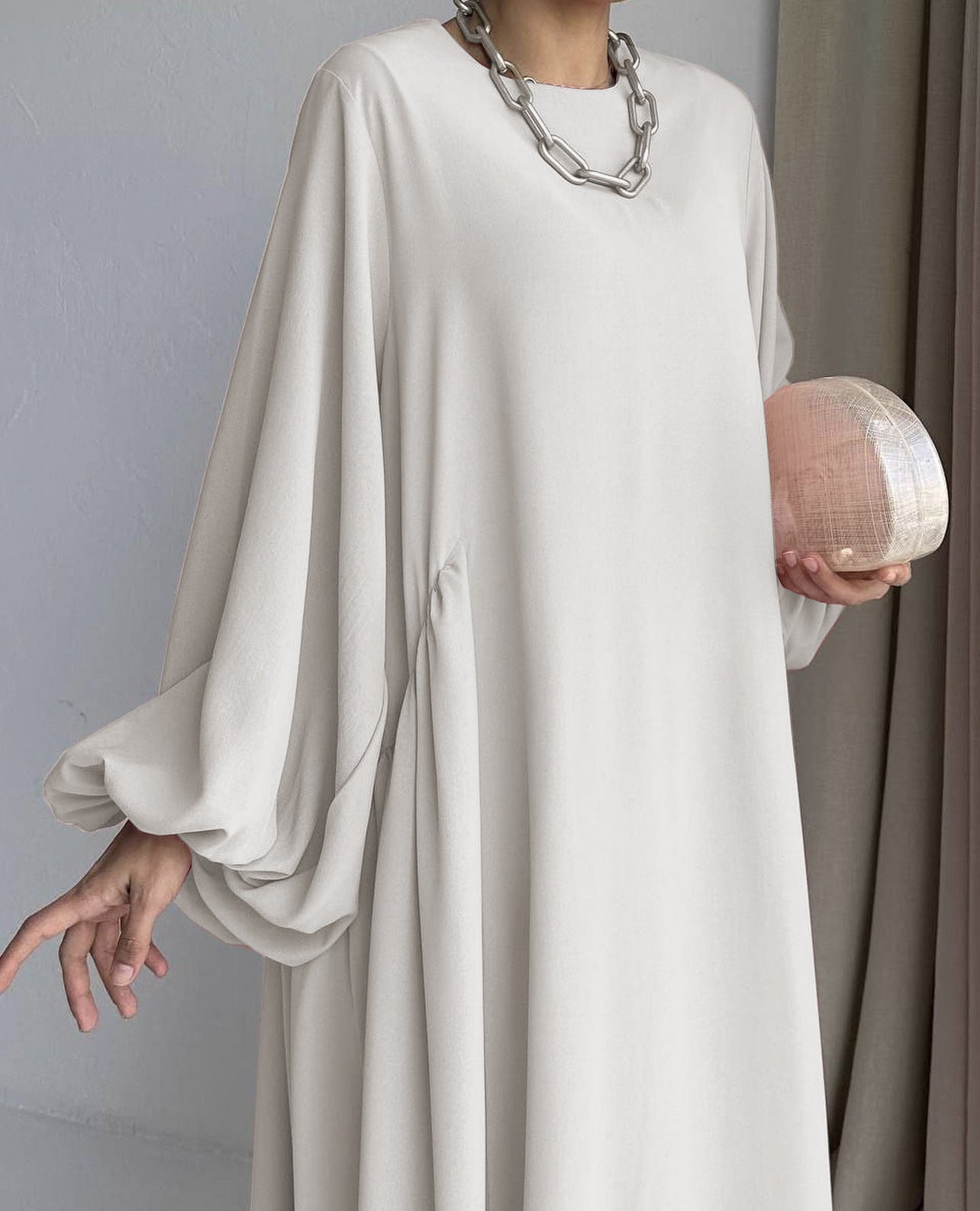 Stay cool in our Cream Beige Modest Summer Abaya, featuring a silky feel, loose fit, and cuff sleeves. Perfect for warm weather. Shop online or in-store in Sydney.